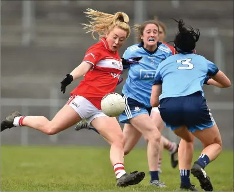  ??  ?? Sadhbh O’Leary of Cork in action against Eabha Rutledge and Emma McDonagh of Dublin during the Lidl Ladies NFL Round 7 match at Mallow Photo by Sportsfile