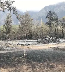  ?? JENIKA WATSON ?? Alpine Stables near the Waterton townsite was destroyed by the Kenow wildfire, which continues to burn out of control.