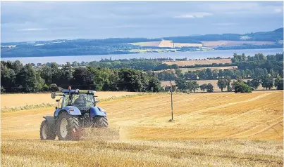  ?? Picture: Jack Ireland. ?? Harvest time at a farm at Liff, Dundee.