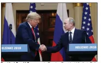  ?? (AP/Alexander Zemlianich­enko) ?? President Donald Trump greets Russian President Vladimir Putin at a news conference after their meeting in Helsinki in July 2018. Trump suggested a “Pakistani gentleman” could have stolen Democrats’ emails during the 2016 campaign despite his own intelligen­ce agencies citing it as part of Moscow’s election interferen­ce.