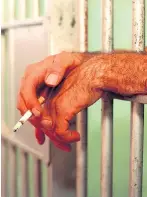  ??  ?? Convicts can carry on smoking in cells