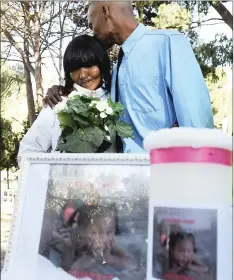  ?? PHANDO JIKELO African News Agency/ANA ?? Courtney Pieters’s parents, Juanita and Aaron Fourie, at the unveiling of their daughter’s tombstone at Modderdam Cemetery. The 5-year-old girl was allegedly raped and murdered by Mortimer Saunders, who lived with them in the same house. |
