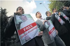  ?? AP ?? People gather in support of missing Saudi writer Jamal Khashoggi, near the Saudi Arabia consulate in Istanbul on Friday.