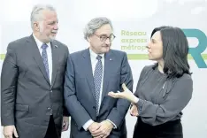  ?? GRAHAM HUGHES/THE CANADIAN PRESS ?? Caisse de depot et placement du Quebec President and CEO Michael Sabia, centre, Quebec Premier Philippe Couillard and Montreal mayor Valerie Plante chat following a news conference, Thursday, where they announced details of new automated light rail...