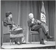  ?? Arkansas Democrat-Gazette/STATON BREIDENTHA­L ?? Former President Bill Clinton (right) talks with Liberian President Ellen Johnson Sirleaf on Monday night in Little Rock during “A Conversati­on with President Ellen Johnson Sirleaf and President Bill Clinton,” part of the Frank and Kula Kumpuris...