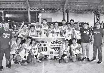  ?? RAEL DIAZ FB ?? WE ARE THE CHAMPS. The Ford Academy of the Arts team celebrates winning the Davao Youth Games (DYG) Developmen­tal League 2018 cadet division title.