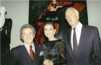  ??  ?? In this file photo taken on October 21, 1991 (from left to right): Victor Skrebneski, Audrey Hepburn and Hubert de Givenchy pose together at the Galliera Museum in Paris during a reception honoring 40 years of Givenchy’s fashion.—AFP photos