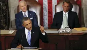  ??  ?? In this Jan. 28, 2014, file photo, Vice President Joe Biden and House Speaker John Boehner of Ohio listen as President Barack Obama gives his State of the Union address on Capitol Hill in Washington. AP PHOTO/CHARLES DHARAPAK