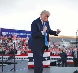  ?? ( Carlos Barria/ Reuters) ?? US PRESIDENT Donald Trump dances to the music as he departs a campaign rally in Carson City, Nevada on Sunday.