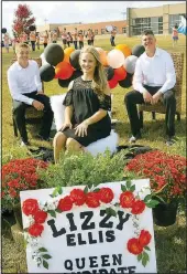  ??  ?? Homecoming queen candidate Lizzy Ellis poses with her escorts Ethan Ellis (left) and Cordell Donell.