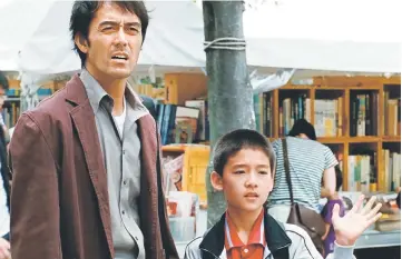  ??  ?? Hiroshi Abe (left) and Taiyo Yosizawa in “After the Storm.” — Photo by Film Movement