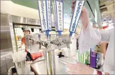  ??  ?? THERE’S KOMBUCHA on tap in various f lavors including pineapple, peach and watermelon at Farmers Market to-Go in Terminal 5.