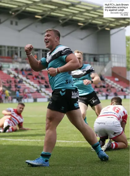  ?? RICHARD SELLERS/ PA WIRE ?? Hull FC’S Jack Brown celebrates scoring a try against Leigh