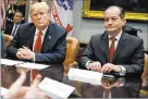  ?? Evan Vucci The Associated Press file ?? President Donald Trump and Labor Secretary Alexander Acosta attend a meeting in the White House in 2018.