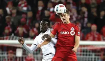  ?? STEVE RUSSELL/TORONTO STAR ?? TFC defender Nick Hagglund, getting his head on the ball in the Reds’ knockout round win over Philadelph­ia, has received more playing time late in the season. “You always want to be playing in the big games,” he says.