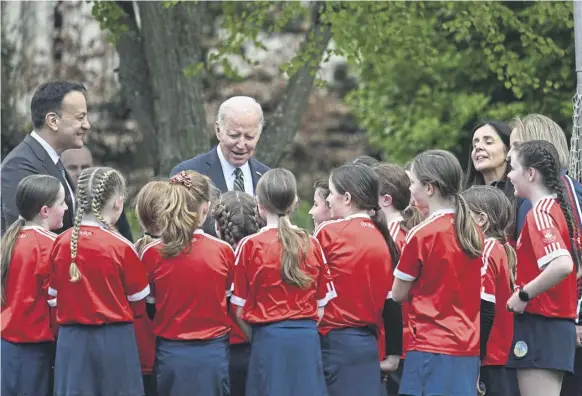  ?? PICTURE: JIM WATSON/AFP VIA GETTY ?? The words of US President Joe Biden, seen meeting school children in Dublin, should inform the debate about education in Scotland