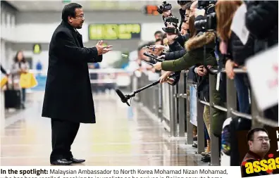  ??  ?? In the spotlight: Malaysian Ambassador to North Korea Mohamad Nizan Mohamad, who has been recalled, speaking to journalist­s as he arrives in Beijing enroute home.