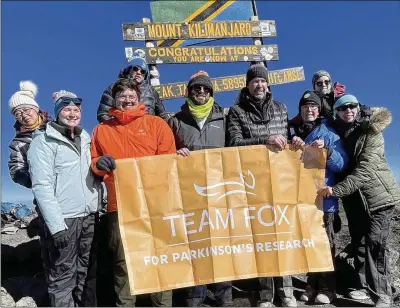  ?? COURTESY OF BETTY FRANCES THOMASON ?? Emory University sophomore Betty Frances Thomason and eight others climbed to the top of Mount Kilimanjar­o to raise funds for Parkinson’s disease research. Team Fox, as they were called, made the climb in eight days and raised more than $150,000. Four of the climbers have the disease. Thomason and four others have a parent who has the disease.