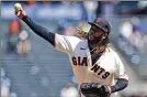  ?? AP ?? Ex-Reds pitcher Johnny Cueto kept his former team scoreless into the sixth inning Wednesday.