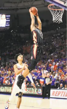  ?? Matt Stamey / Associated Press 2019 ?? Vassell, shown dunking, has an effective jumper as he shot 41.5% percent from 3point range and 49% overall last season.