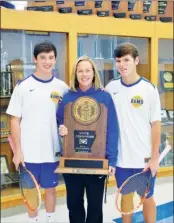  ?? WILLIAM HARVEY/TRILAKES EDITION ?? With coach Shawny Green holding the trophy they won as the overall doubles tennis champions in the state this year are Hot Springs Lakeside tennis players Jack Henry Hill, left, and Spencer Kauffman. The duo recently received the Wendy’s Boys Tennis...