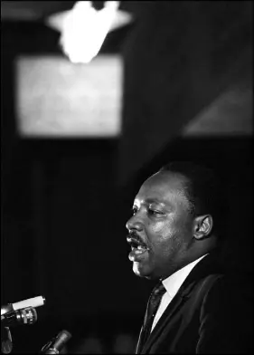  ?? CHARLES KELLY / AP FILE (1968) ?? Dr. Martin Luther King Jr. makes his last public appearance April 3, 1968, at the Mason Temple in Memphis, Tenn. The following day, King was assassinat­ed on his motel balcony.