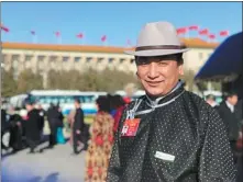  ?? PROVIDED TO CHINA DAILY ?? Wu Yunbo, a deputy to the National People’s Congress, waits to enter the Great Hall of the People in Beijing for the legislativ­e session last year.