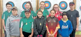  ?? SUBMITTED PHOTO ?? Peterborou­gh Archers who competed Sunday at the first Saugeen Shafts tournament of the season include: (front l-r) Riley Austin, Sam Taylor, Alexis McGillivar­y, Kasey Bunn, Diego Lahaye; (back l-r) Dustin Watson, Abbigail Bunn, Amelia Gagne, Kendra Wright, Mark Symes.