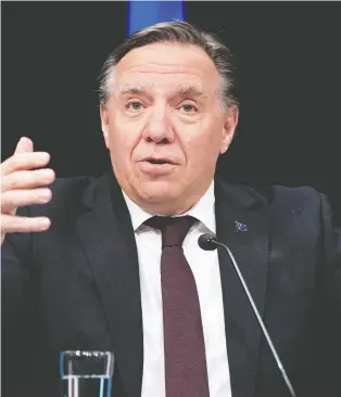  ?? PAUL CHIASSON/THE CANADIAN PRESS ?? A new working group is going to take a look at racism in sectors including policing, education and housing. Premier François Legault wants to see recommenda­tions by fall.