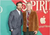  ?? AFP ?? Ryan Reynolds, left, and Will Ferrell star in ‘Spirited.’