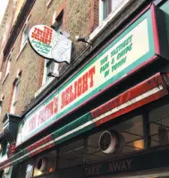  ?? PHOTO BY WILL HAWKES FOR THE WASHINGTON POST ?? The Fryer’s Delight, a fish-and-chip restaurant in London’s Holborn neighbourh­ood, features a sparse 1960s interior that is a charismati­c classic of the genre.