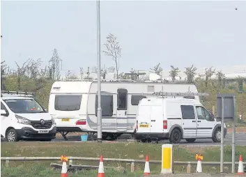  ??  ?? On site North Lanarkshir­e Council are investigat­ing the travellers at Newhouse