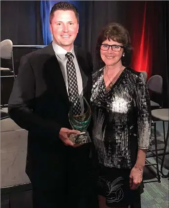  ?? Photos by Matthew Liebenberg ?? Jeff Chambers with his mother, Melody, who attended the PGA of Canada national awards presentati­on in Orlando, Florida, Jan. 24.