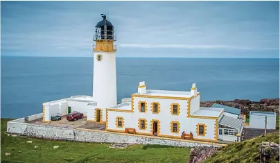  ??  ?? Shining on: Rua Reidh Lighthouse in Ross-shire is for sale at £450,000, struttandp­arker.com