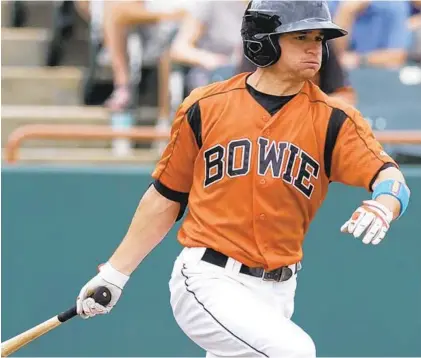  ?? BOWIE BAYSOX ?? Buck Britton, pictured playing for Double-A Bowie in 2013, is set to start his second season as the team’s manager.