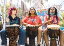  ?? ADRIANA HELDIZ U-T ?? During the week-long Rock n’ Roll Camp for Girls, San Diego students learn to play an instrument, write a song and perform.