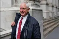  ?? (AP/Seth Wenig) ?? Attorney Alan Futerfas, representi­ng former President Donald Trump, leaves the courthouse Wednesday in New York.