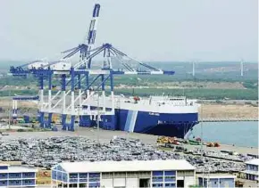  ?? REUTERS PIC ?? The billion-dollar port project in the district of Hambantota in Sri Lanka ended in bankruptcy, with the developer taking control of the facility on a 90-year lease.