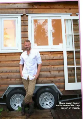  ??  ?? Home sweet home! Avi in front of his “tiny
house” on wheels.