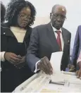  ??  ?? 0 Former president Robert Mugabe casts his vote