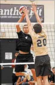  ?? GENE WALSH — DIGITAL FIRST MEDIA ?? Christophe­r Dock’s Lincoln Bergey spikes past a Bethlehem Catholic’s Mike Karoly.