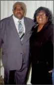  ??  ?? The Rev. Elbert Harris with Altheimer Mayor Zola Hudson