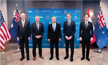  ?? ?? Ken McCallum, right, with other intelligen­ce heads from the Five Eyes agencies at a summit hosted by the FBI in California. Photograph: FBI
