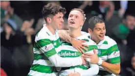  ?? AP ?? Griffiths (centro) ha celebrado goles con Ryan Christie y el tico Gamboa.