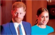  ?? — AFP file photo ?? Harry and Meghan leave a er a ending the Endeavour Fund Awards at Mansion House in London on March 5.