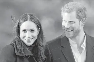  ?? Frank Augstein / Associated Press ?? Britain’s Prince Harry and his fiancée, Meghan Markle, arrive at Nottingham Academy in Nottingham, England. The engagement mirrors broader trends in interracia­l marriage both in the U.S. and the United Kingdom.