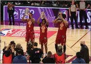  ?? TIM PHILLIS — FOR THE NEWS-HERALD ?? Evan Mobley, Darius Garland and Jarrett Allen pose during NBA All-Star Saturday Night.