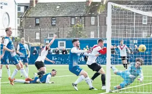  ?? ?? Callum Smith’s header enters the net to pull Airdrie level at 1-1