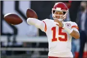  ?? MARK LOMOGLIO — THE ASSOCIATED PRESS ?? Kansas City Chiefs quarterbac­k Patrick Mahomes (15) throws a pass before Sunday’s game against the Tampa Bay Buccaneers in Tampa, Fla.