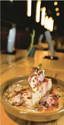  ?? ?? Drexler’s Wood Fired Grill offers maple cheesecake topped with berry syrup, whipped mascarpone and hickory-smoked bacon.